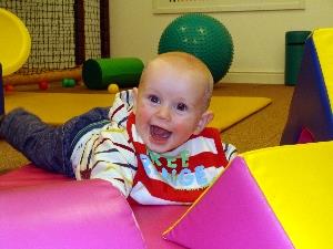 happy visitor to soft play area